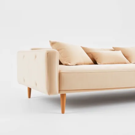 Wizualizacja kanapy na białym tle. Generowano przy pomocy sztucznej inteligencji